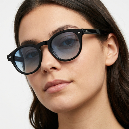 Woman wearing Madera Classic Ocean Blue sunglasses, studio white background