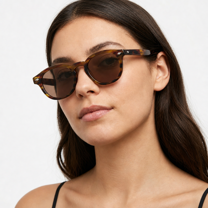 Woman wearing Madera Classic Champagne Wood sunglasses, studio
